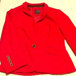 Red blazer with black & gold accent buttons